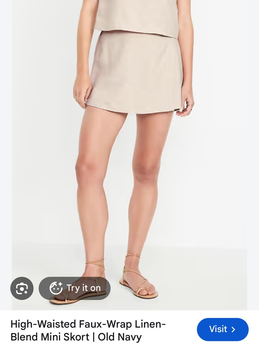 Black High-waisted faux wrap linen mini skirt